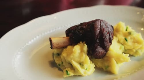 Roasted Meat and Mashed Potatoes Close-Up Food Shot