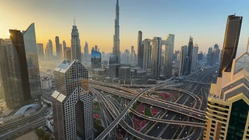 Time lapse of Downtown Dubai skyline at sunrise in Dubai, United Arab Emirates