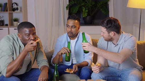 Friendship, Food and People Concept - Happy Male Friends with Beer Eating