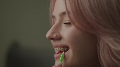 Woman Washing Her Teeth with Dental Braces Dental Braces Brush Cleaning Process