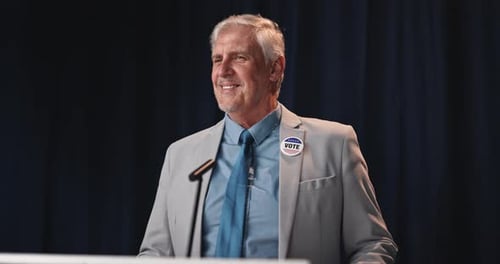 Man Gives Political Speech at Podium