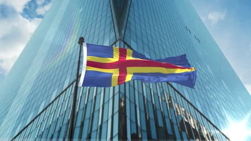 Realistic Flag Waving on Pole in Front of Modern Building