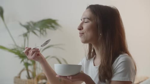 Woman Eating Healthy Food at Home