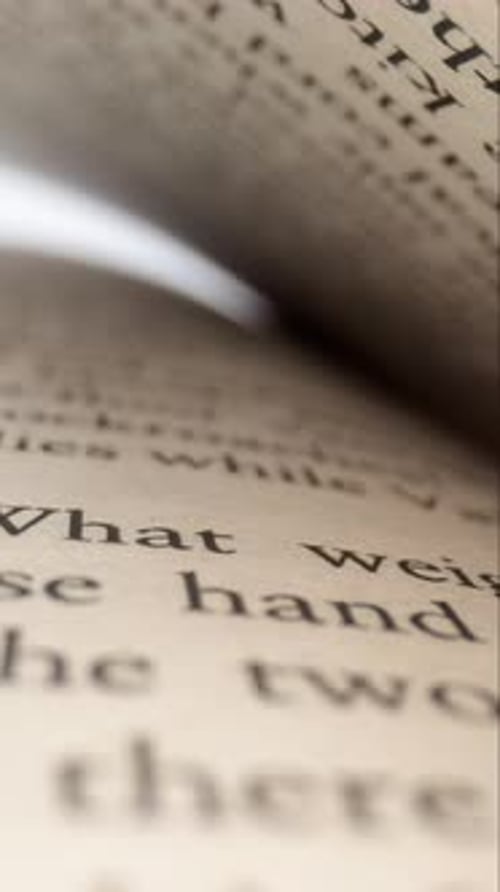 Macro Footage of Old Book Pages with Black Letters