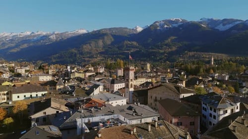 Comune Of Cavalese With View Of The Crenellated Bell Tower Of Chiesa di San Sebastiano In Fiemme