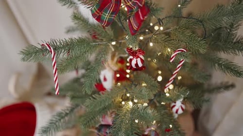 Festive Christmas Tree with Bright Decorations. Close-up shallow focus
