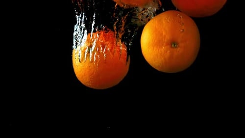 Super Slow Motion Orange Slices Fall
