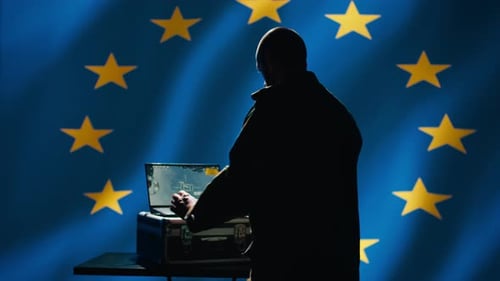 Silhouette Coding in Front of European Union Flag