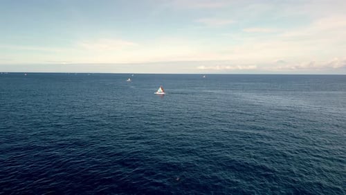 Aerial View on Ocean Boat Floating on Blue Water at Summer Landscape of Blue Sea