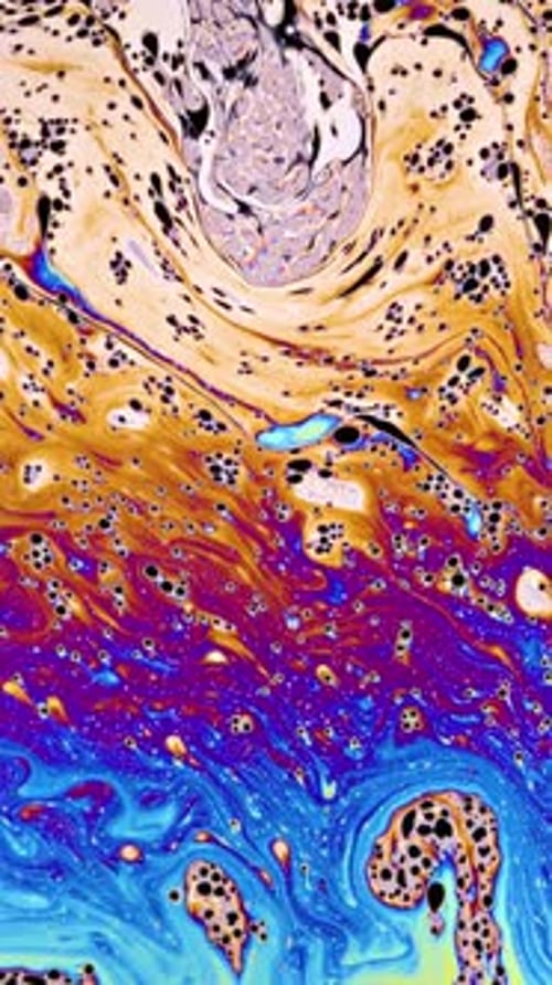 Macro soap bubble creates a colorful and psychedelic background