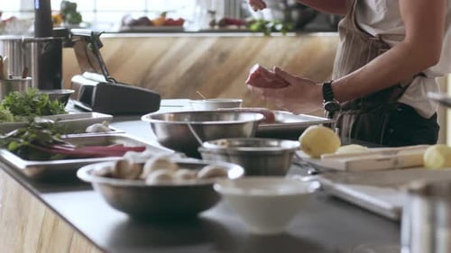 Chef Preparing Beef in Commercial Kitchen