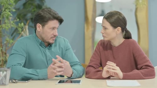 Close Up of Talking Creative People Discussing Project