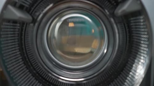 View From Inside the Empty Washing Machine Young Man Walks Into the Room with Laundry Basket