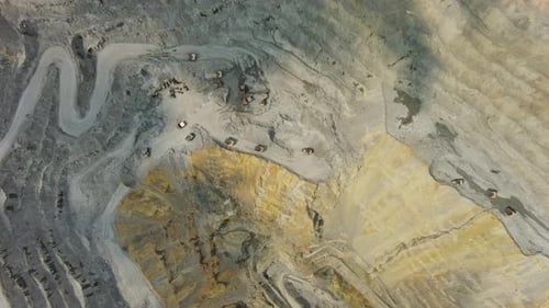 Aerial of Open Mine and Heavy Mining Equipment