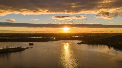 Aerial sunset over lake