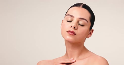 Neck, glow and skincare with woman in studio for aesthetic, beauty and skin wellness
