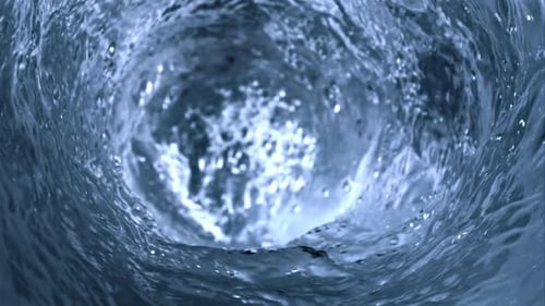 Super Slow Motion of Water in a Whirlpool