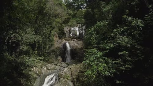 A beautiful waterfall cascading on Tobago's tropical island.