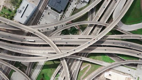 Drone Top Down Wide View Famous Road Intersection with Traffic on Multiple Flyovers