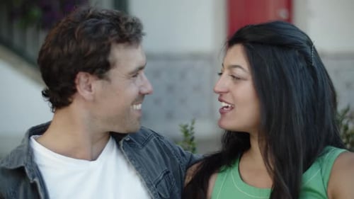 Young Adults Talking Face To Face