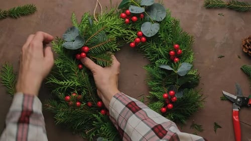 Creating a Christmas Wreath with Berries and Pine