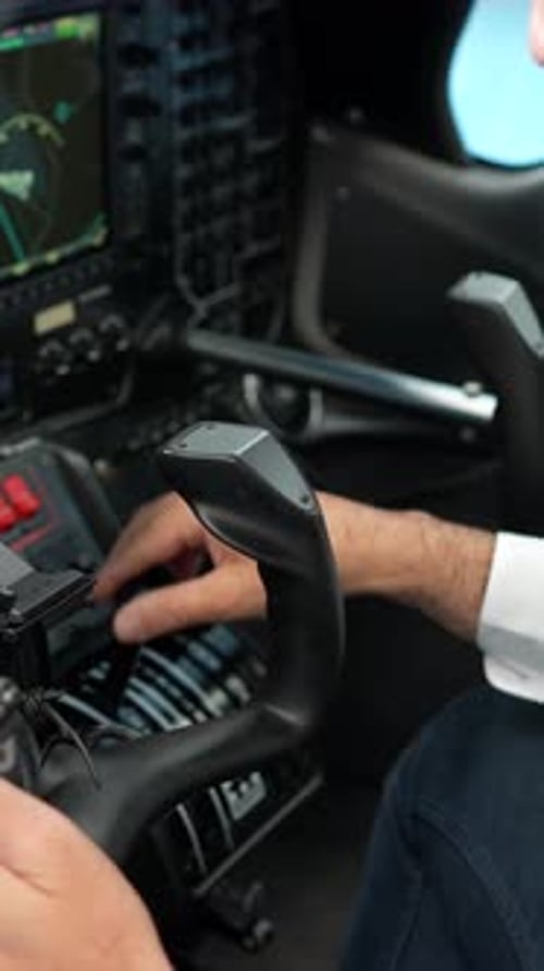 Pilot Hands Flying a Small Aircraft in the Cockpit