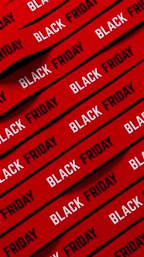 Waving Red Ribbons with Black Friday Text for Retail Sale Promotion and Shopping Advertisement 3D