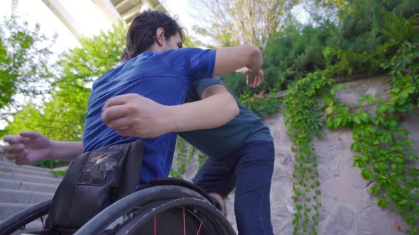 Hug. The friend who hugs the young person with a physical disability ...