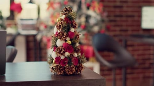 Christmas Tree and Festive Ornaments on Office Desk