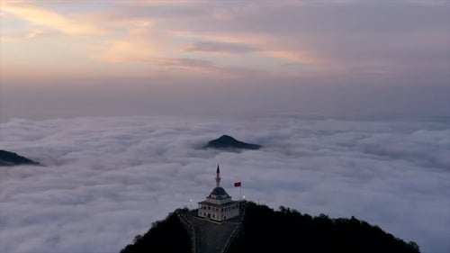 Aerial view of the mosque on the top of the mountain by drone