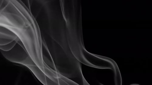 Abstract Smoke Flowing on Black Background