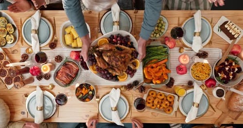 Overhead Shot of Table with Roasted Turkey and Food