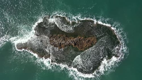 Aerial view of small island in the open ocean. Israel, Pigeon Island Near Maagan Michael Beach