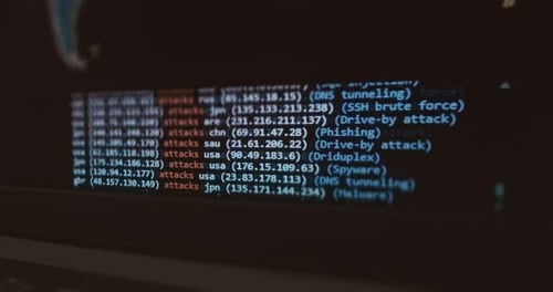 Cyber Attack Log on Monitor Screen Close Up