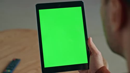 Guy Finger Touching Greenscreen Tablet at Office Room Man Using Chroma Key Tab