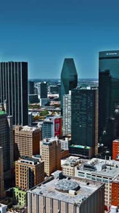 Aerial view of downtown Dallas showcasing urban architecture and skyline