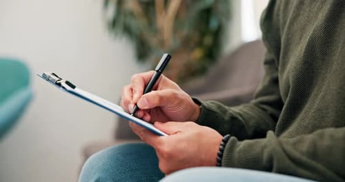 Clinic, man hands and waiting room with clipboard, insurance checklist and writing about health