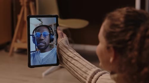 Girl Video Calling Boyfriend via Digital Tablet
