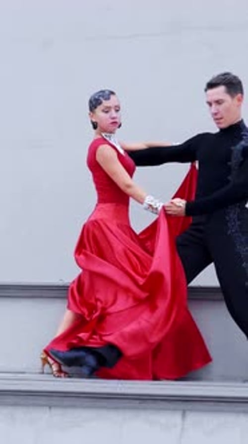 Ballroom Dancers Perform on Steps Outdoor During Day