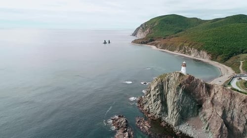 Aerial View of an Old Lighthouse on the Cliff on Pacific Coast Beautiful Panoramic Seascape