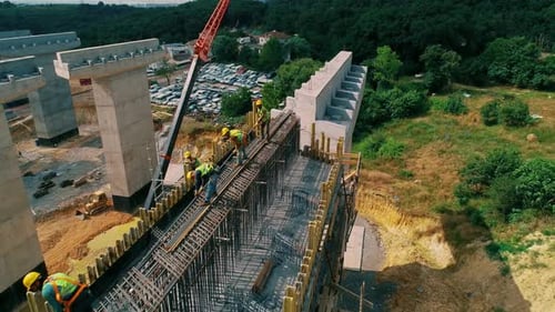 Iron Lining Bridge Columns, Workers