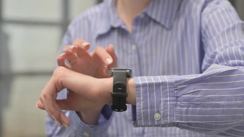 Close up of Woman Using Smart Watch