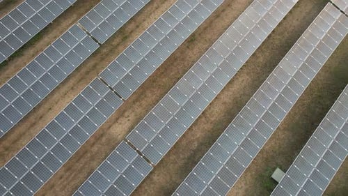 Topview of photovoltaic power plants, Photovoltaic solar system for alternative energy, drone view.
