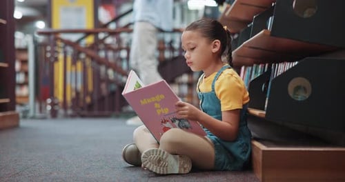 Reading, girl and child in library, knowledge and storytelling with book, development and language