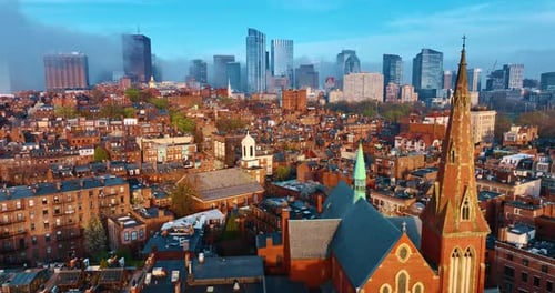 Flying above the bright architecture of Boston.