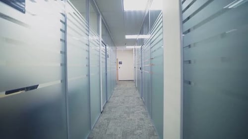 Motion Along Hallway Between Offices with Glass Walls