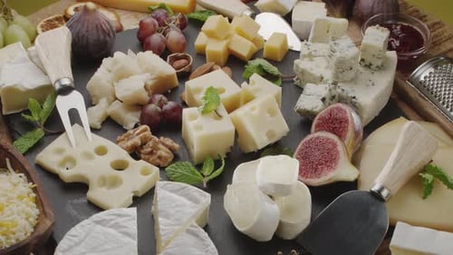 Delicious Cheese Platter with Fruit and Nuts
