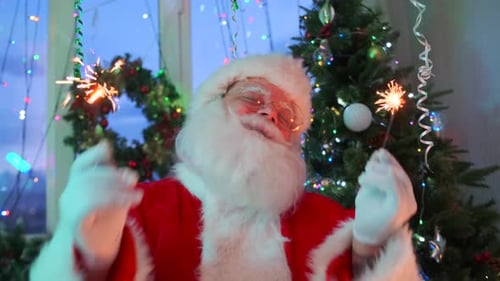 Close up smiling Santa dancing with Bengal fire in hands, merry Christmas party, fireworks