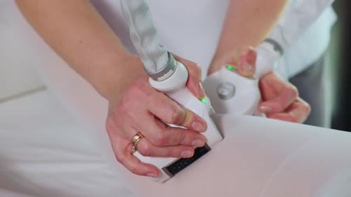 Closeup of the Apparatus Massages with Wrapping Anticellulite Machine Cosmetology Figure Correction