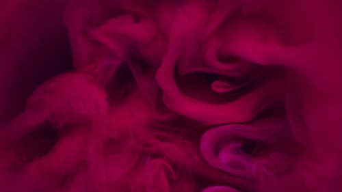 Abstract Magenta Smoke Plumes Against a Black Background